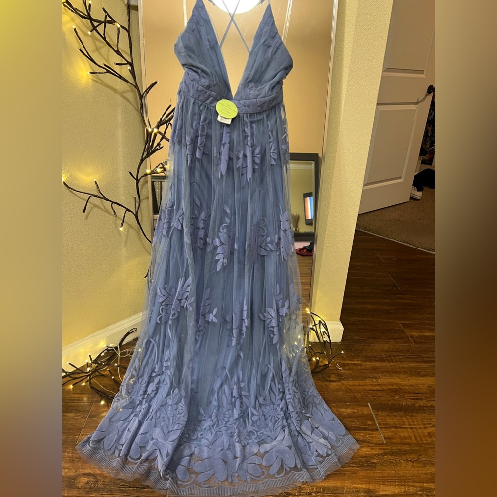 Elegant Blue Evening Gown with Floral Details